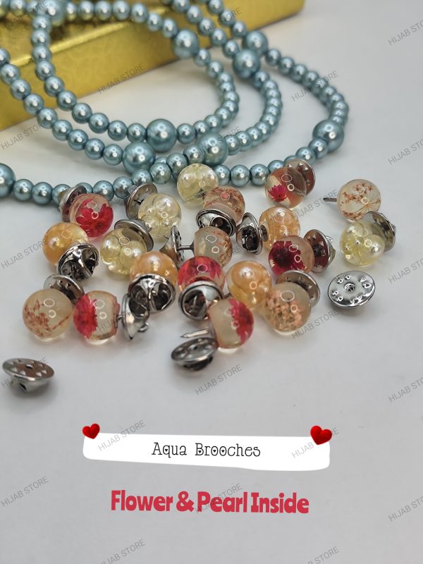 aqua brooches