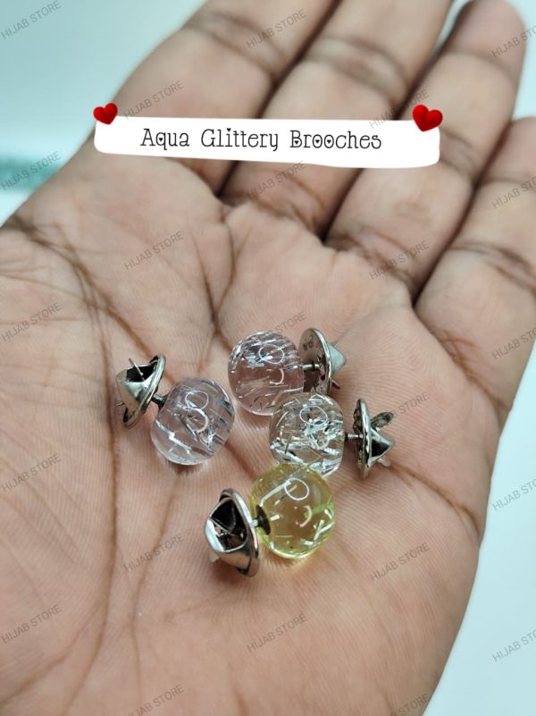 aqua glittery brooch