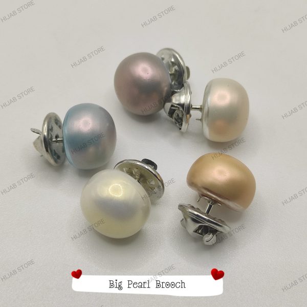 big pearl brooch