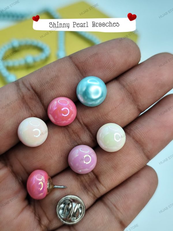 shiny pearl brooch